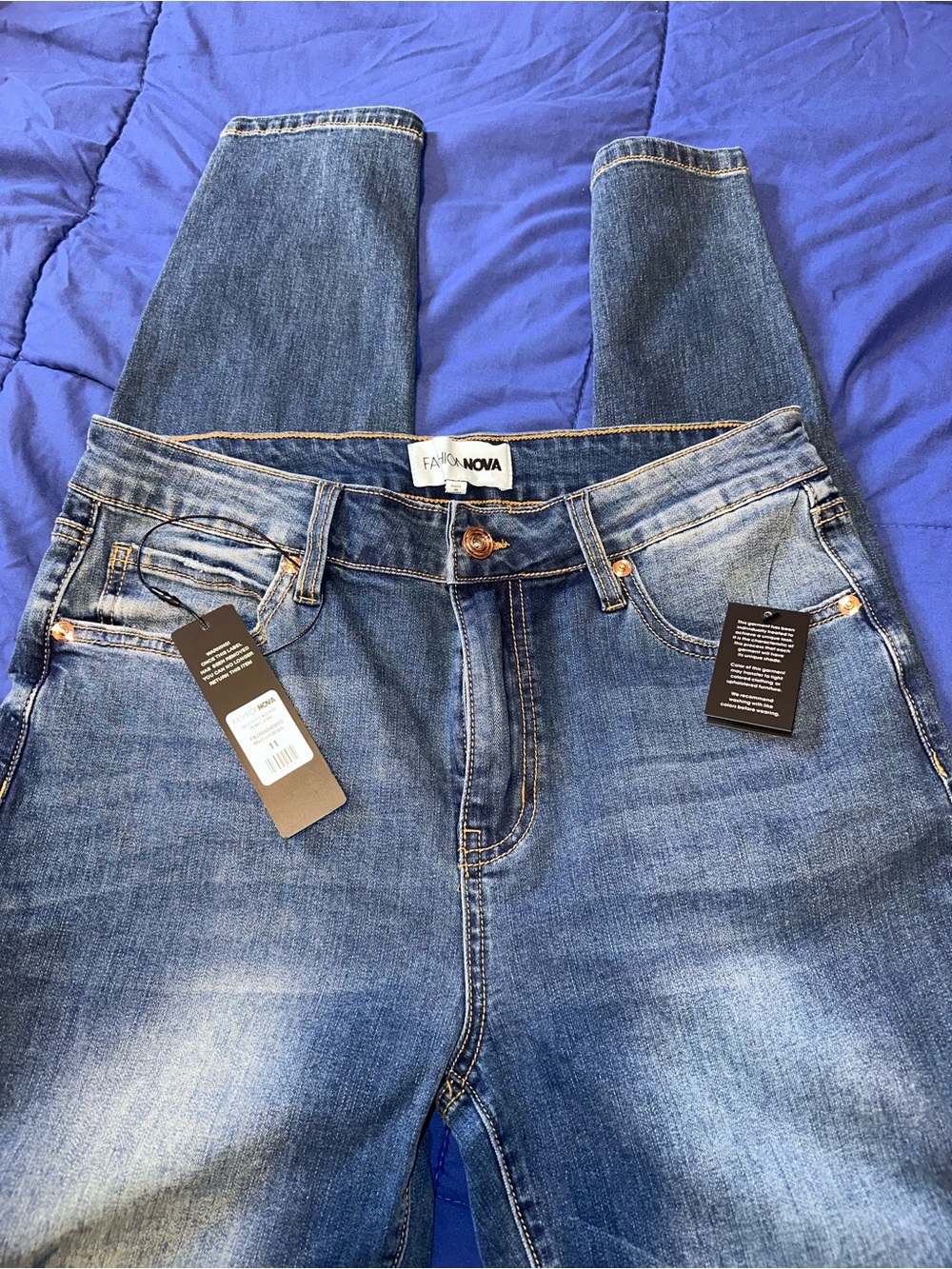Fashion Nova mid rise Medium wash Skinny Jeans( women) size 11